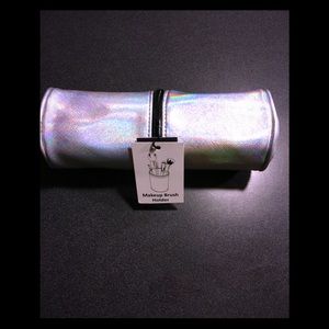 Silver makeup brush holder bag.